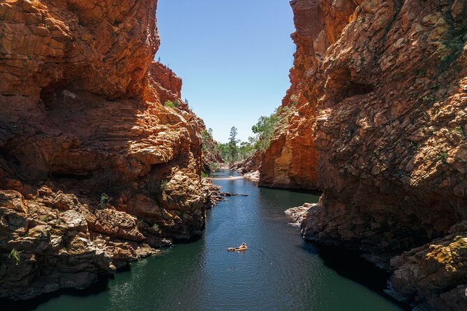 A green waterhole between the walls of a West MacDonnell gorge